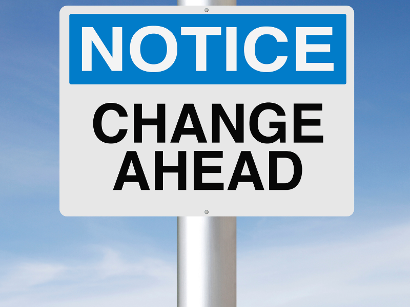 Road sign with the words NOTICE blocked in blue followed by the words Change Ahead in capitals