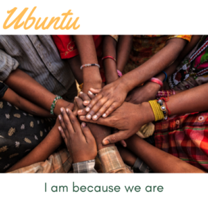 close up of hands on top of each other in a circle with the caption Ubuntu, I am because we are